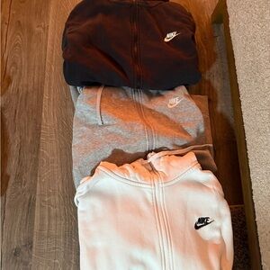 Nike Zip-Up Hoodies in Black, Gray, and White